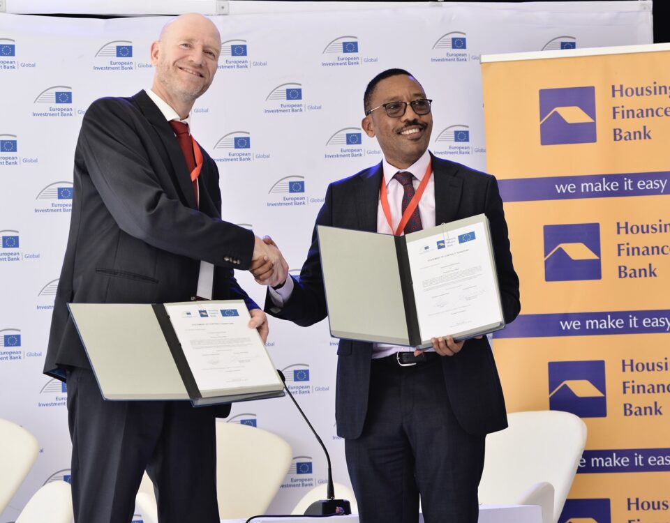 The Head of the European Investment Bank Regional Hub – East Africa, Edward Claessen, with Housing Finance Bank MD, Micheal Mugabi, during the announcement on the sidelines of the Uganda-EU Business Forum